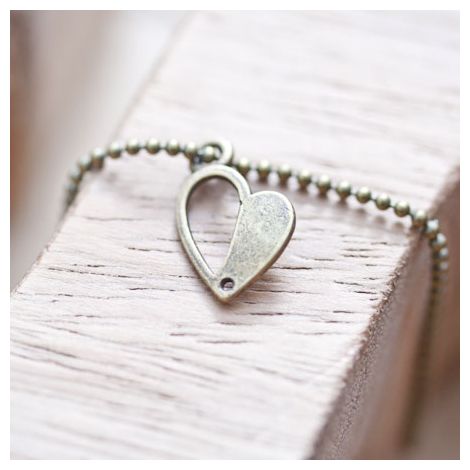 Breloque Coeur mi-plein Bronze vieilli