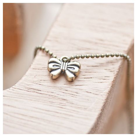 Breloque Mini noeud Bronze vieilli