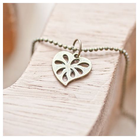 Breloque Petit coeur troué Bronze vieilli