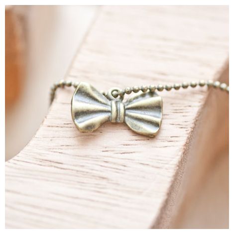 Breloque Petit noeud papillon Bronze vieilli
