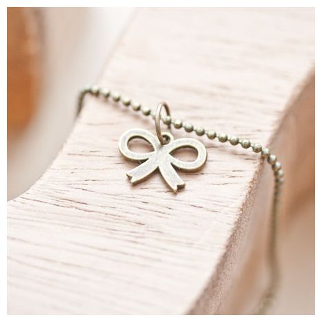 Breloque Petit noeud plat Bronze vieilli