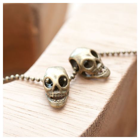 Perle en métal 15x8mm Tête de mort Bronze vieilli