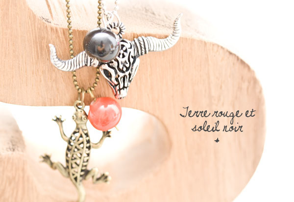 Les pendentifs Terre rouge et Soleil noir